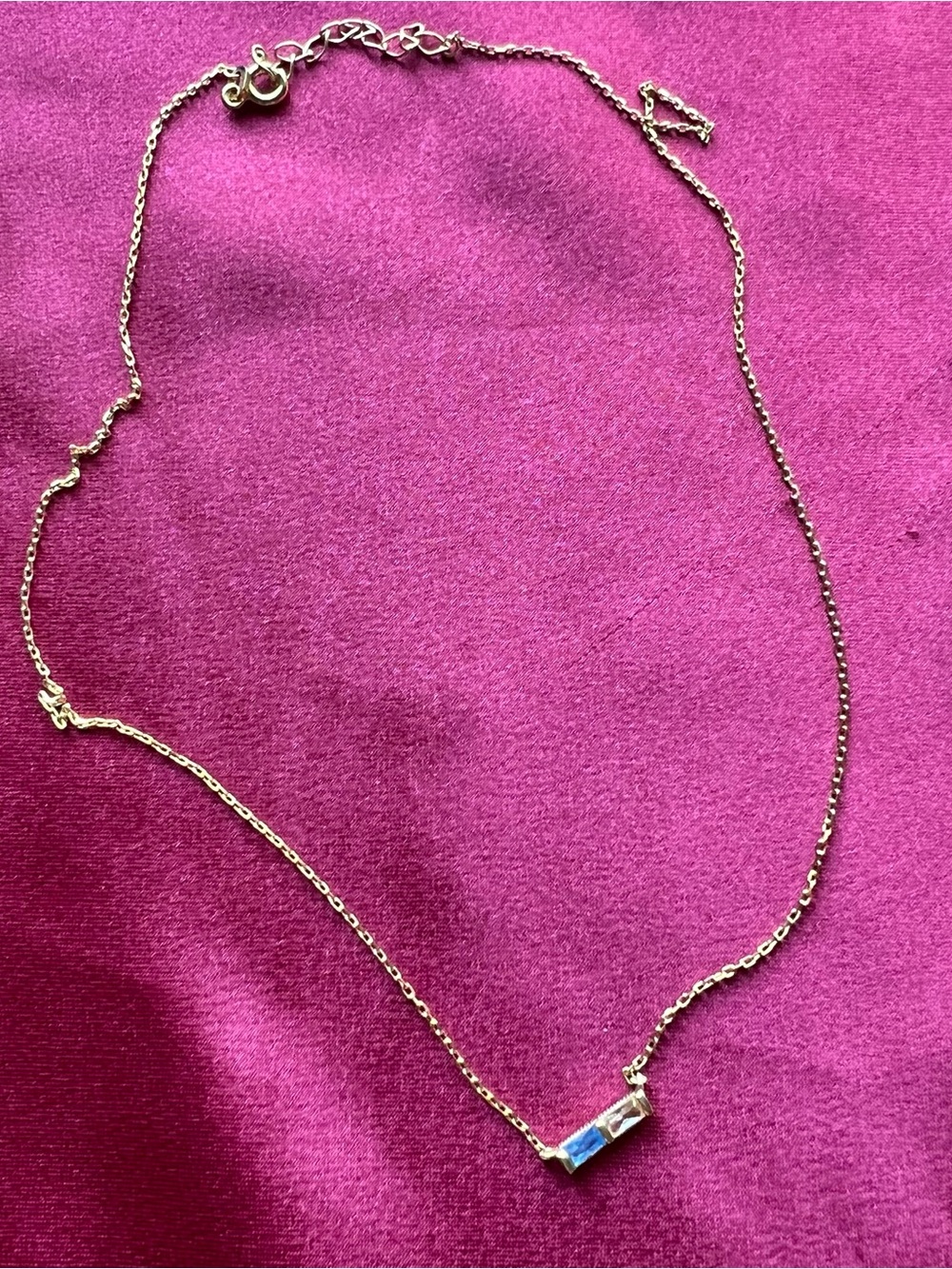 Gold Tone Bar Pendant Necklace with Blue Accent